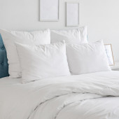 Oreiller Sensation duvet Alpes blanc dans une chambre