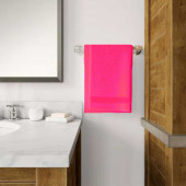 Serviettes bambou fuchsia mises sur accroche murales