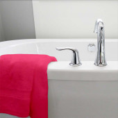 Drap de bain 70x140 cm 100%  coton posé sur baignoire fuchsia