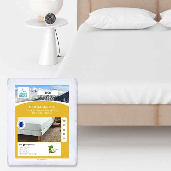 protège matelas 400 grammes avec encart et posé sur le lit