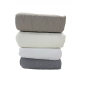 Quautre jetés de lit coloris tendance 100 % matière naturelle