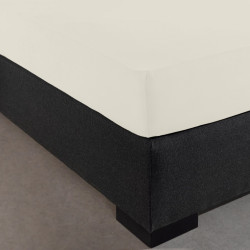 Visuel mis sur le coin du lit drap housse jersey extensible blanc