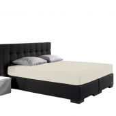 Visuel d'ambiance sur tout le lit, le drap housse en jersey extensible coloris blanc