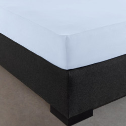 Visuel mis sur le coin du lit drap housse jersey coloris bleu