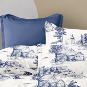 Zoom sur la HDC percale blanche aux motifs bleu discret, visuel d'ambiance de la housse de couette réversible