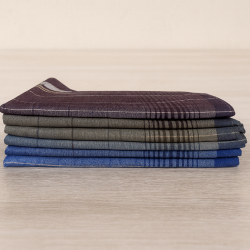 Visuel pile de 6 mouchoirs à carreaux bigarrés sur fond d'ambiance