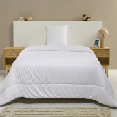 Couette été anti-transpiration 200 g/m² - Légère et respirante - Fabrication Française - Enveloppe toucher peau de pêche