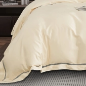 Housse de couette brodée 220x240 cm satin de coton 120 fils/cm² avec taies à volant 65x65 cm - Luxe et élégance