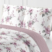 zoom taies d'oreillers boutis florale mauve et rose sur fond blanc