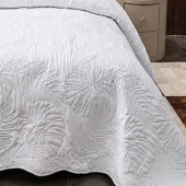 Zoom détails du matelassé motif feuillage blanc