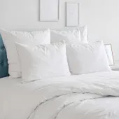 Oreiller Sensation duvet Alpes blanc dans une chambre