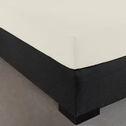 Visuel mis sur le coin du lit drap housse jersey extensible blanc