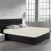 Visuel d'ambiance sur tout le lit, le drap housse jersey extensible coloris blanc