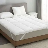 Surmatelas en plumes : confort haut de gamme