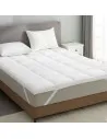 Surmatelas en plumes : confort haut de gamme