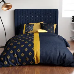 Housse de couette Nil 240x220 cm avec motifs fleurs et écailles bleu nuit et or ocre.